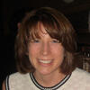 Terri Fry Kasuba looking at the camera.