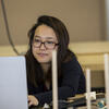 A student looking at a computer.