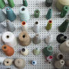 Spools of blue yarn.