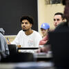 student sitting at a desk in a classroom