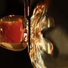 Hot glass being molded.