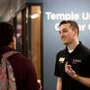 A student talks to a Temple University Career Center employee