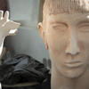 A ceramic sculpture of a head.
