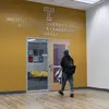 Person walking into the IDEAL office