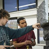 Two Tyler students talking.