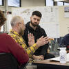 Tyler students and professor having a discussion.