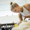 A tyler ceramics student working with clay.