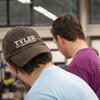 A student wearing a Tyler hat.