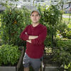 Joshua Caplan crossing his arms and looking at the camera.