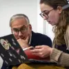 A Tyler professor working with a student