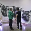 Sculpture installation with neon lights in a gallery