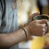 A Tyler ceramics student holding a mug.