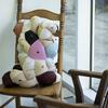 A sculpture created by a Tyler student resting on a chair.