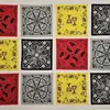Grid of twelve design patterns in red, black, black, white, gray and yellow