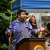 a man standing at a podium giving a speech