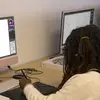 student works on a project using the computer lab