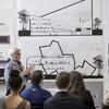 An architecture student presenting to her class at Tyler.