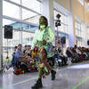 student walks on a runway inside