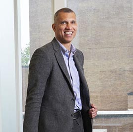 Clifton Fordhamsmiling and posing in a studio